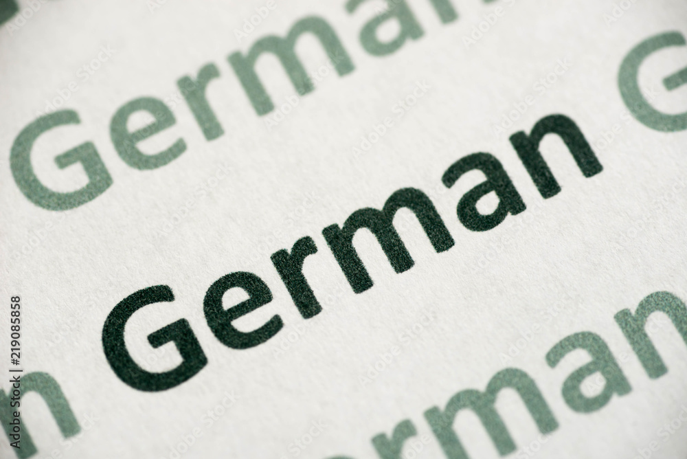 word German language printed on paper macro