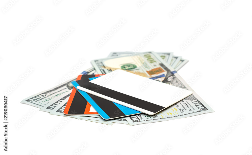 Dollar bills with credit cards on white. Dollar bills with credit cards on white.