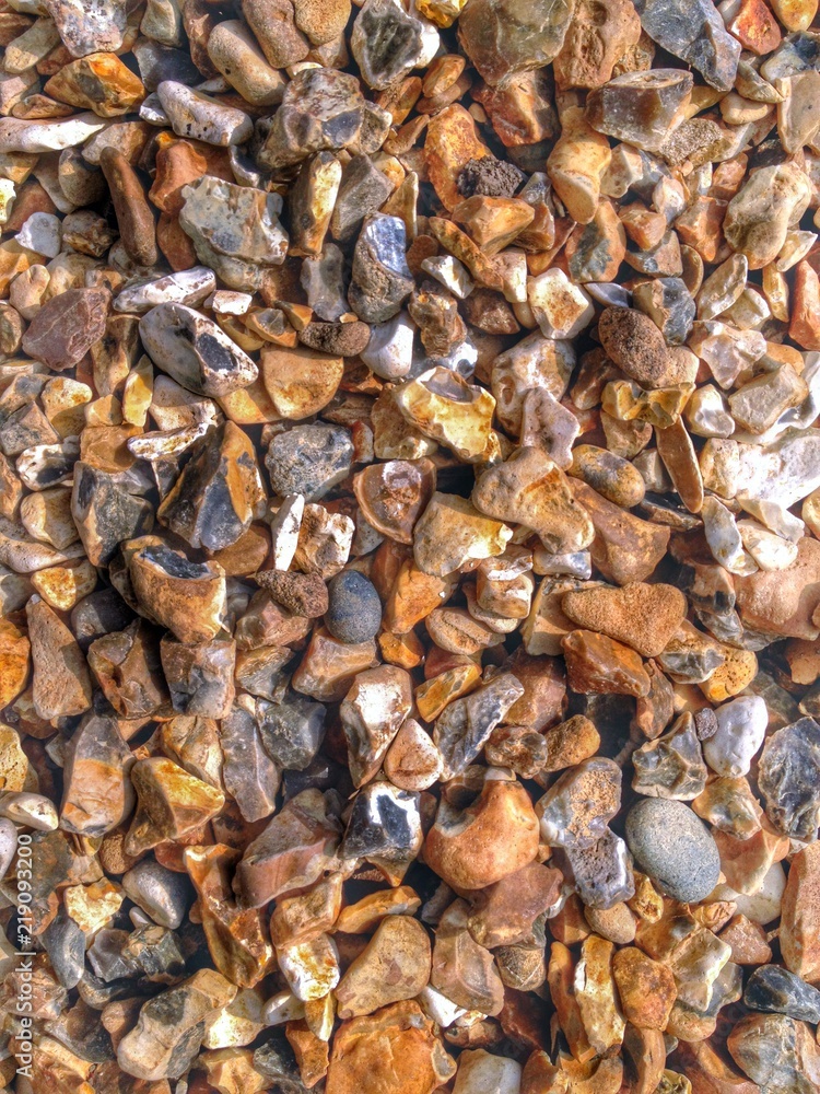 Garden landscaping gravel full frame close up texture background. Mobile phone photo with some phone or tablet post processing. Garden landscaping gravel full frame close up texture background. Mobile phone photo with some phone or tablet post processing.