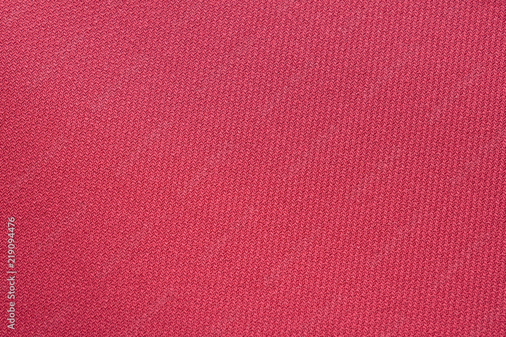 Fototapeta premium crimson textile background.Fabric surface