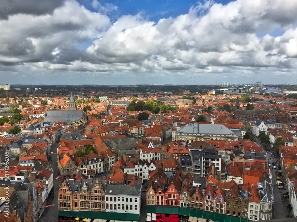 Aerial view from the belfry over bruges belgium on sunny day with red rooftops 