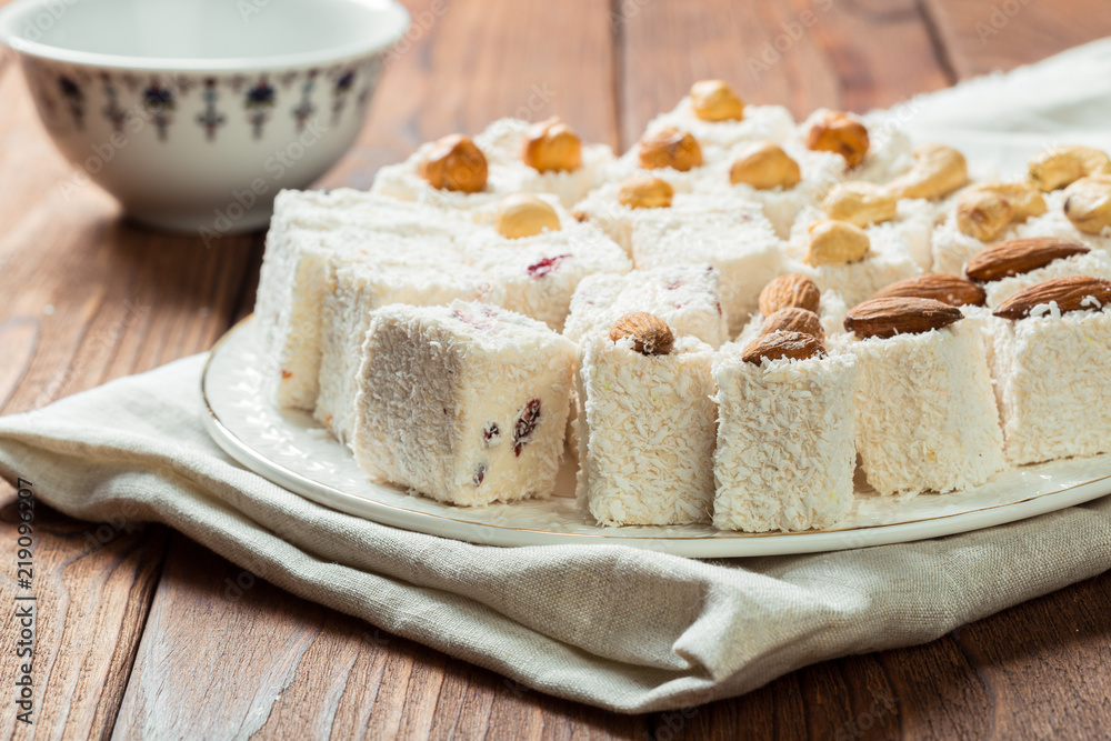 Turkish delight on a wooden table.