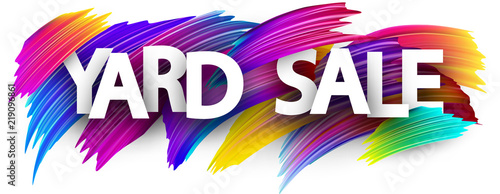 Yard sale poster with colorful brush strokes. photo