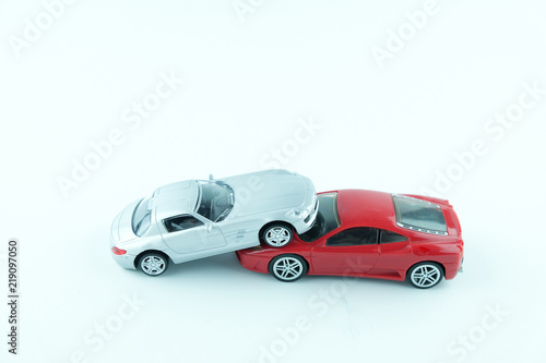 Close up of two cars accident, car crash insurance.Transport and accident concept on white background.. © Konkapp