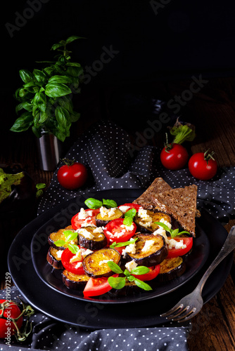 Eggplant grilled with aromatic feta cheese and tomatoes