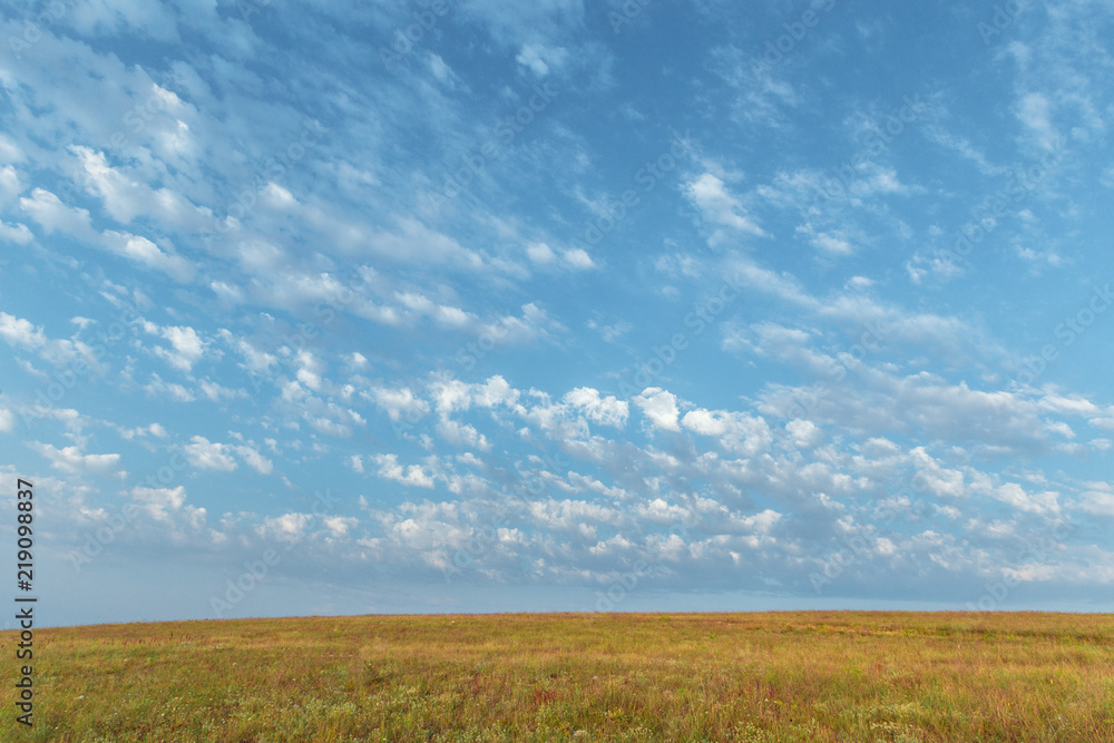 Blue sky and beautiful cloud. Plain landscape background Blue sky and beautiful cloud. Plain landscape background