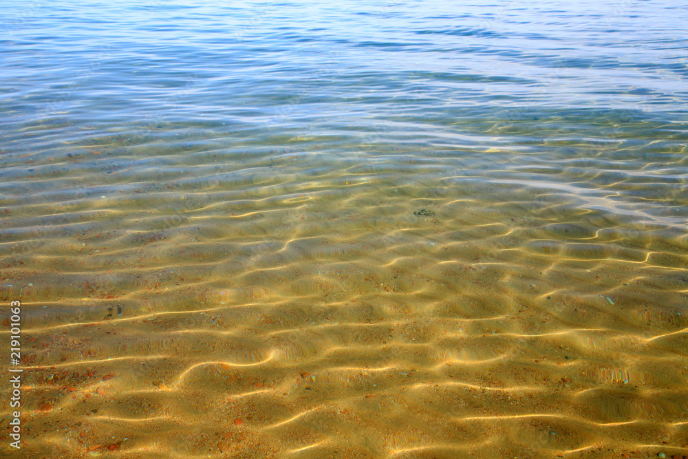 Blue clear water. Sea, lake, sun, beach, vacation Background for inserting images and text. Tourism, travel. Blue clear water. Sea, lake, sun, beach, vacation Background for inserting images and text. Tourism, travel.