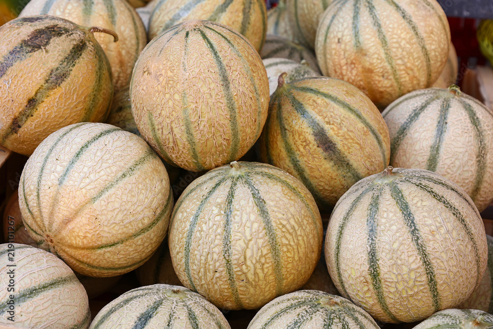 Close up fresh cantaloupe melons on retail display