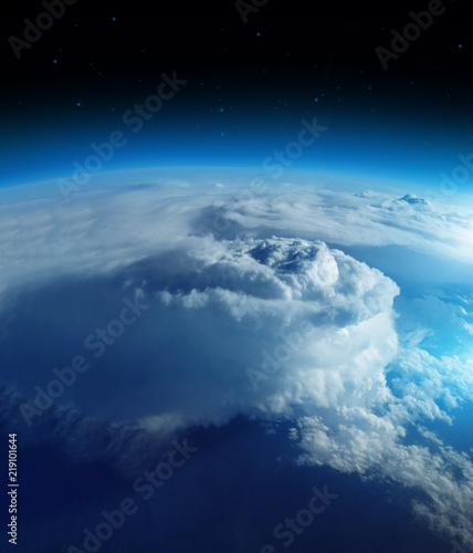 Storm from space on the blue planet earth, 20km above ground / real photo. Elements of this image furnished by NASA photo