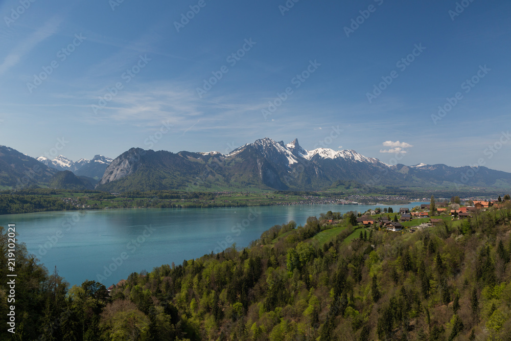 Switzerland - panoramic view from a hill down onto blue lake with snowtopped mountain in the background.jpg