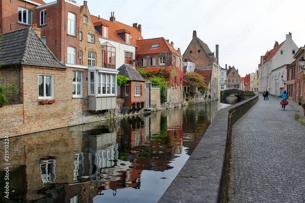 Canal in bruges belgium in autumn 