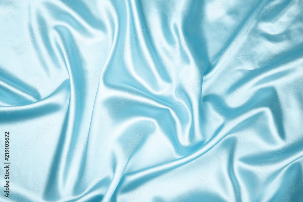 Blue luxury satin fabric texture for background Blue luxury satin fabric texture for background