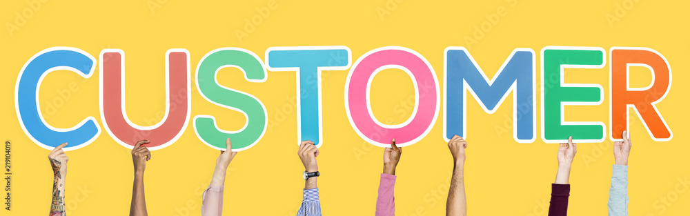 Hands holding the word customer Hands holding the word customer