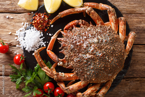 Принти на полотні Preparation for cooking food spider crab with fresh ingredients close-up on a table