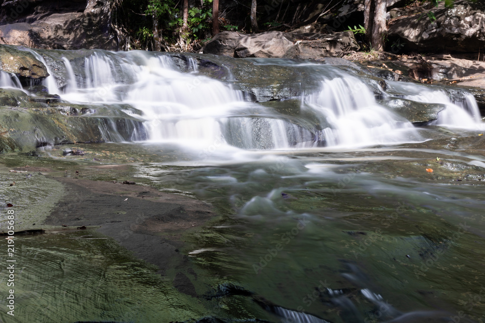 Fototapeta premium Beautiful waterfall in the national park forest in Thailand