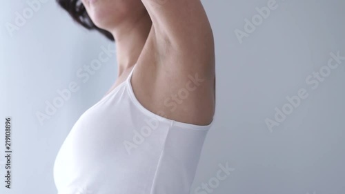 Skin Care. Woman Using Deodorant Spray For Armpit Skin