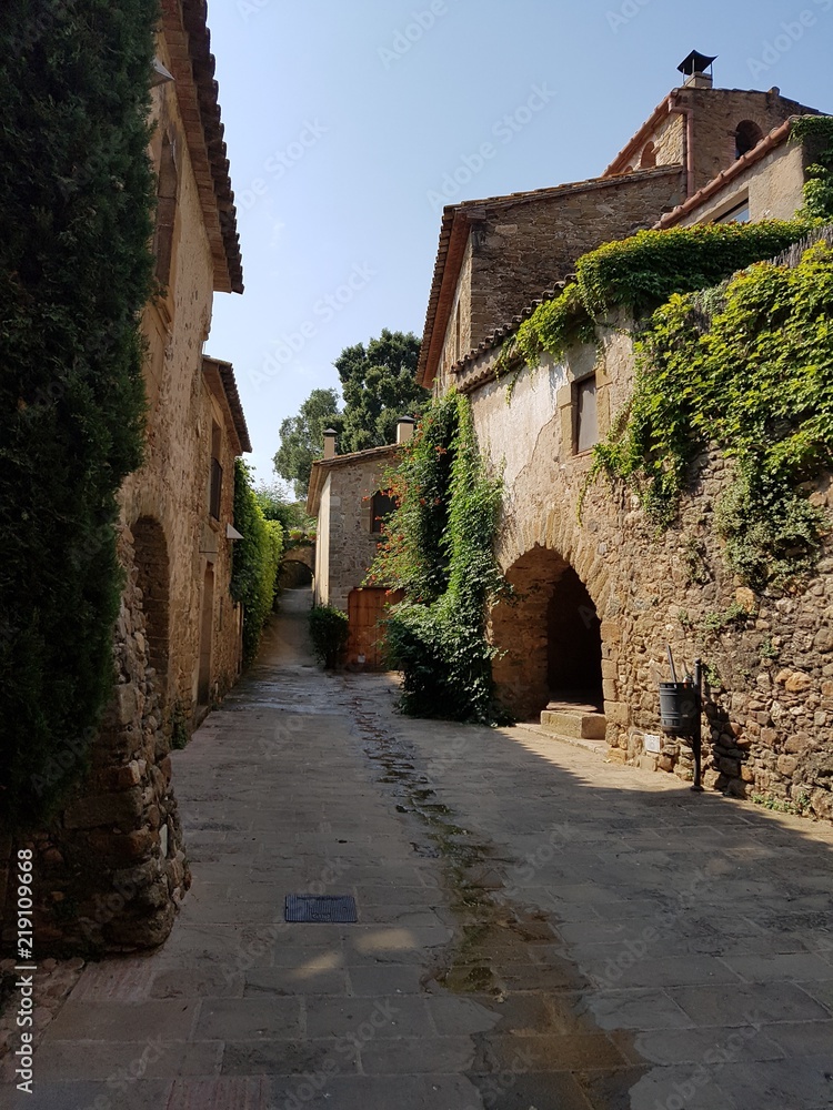 Medieval town with stone constructions at Monells, Catalonia
