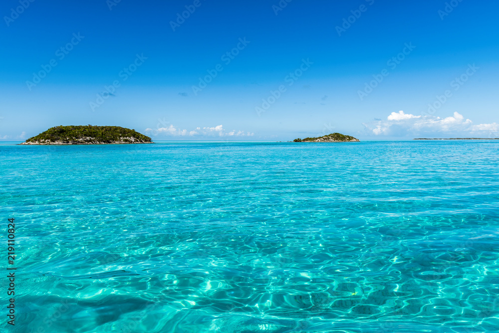 One of the many islands of the Bahamas surrounded by deep blue sea One of the many islands of the Bahamas surrounded by deep blue sea
