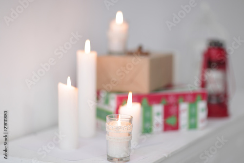 blurred image. candles and gift boxes .photo with copy space