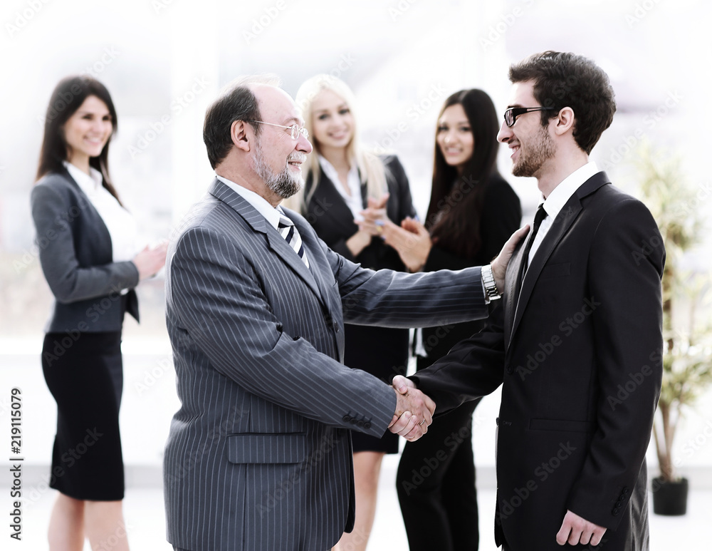 meeting of business people in the office.business handshake. meeting of business people in the office.business handshake.