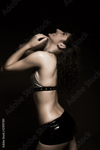 young woman on black background