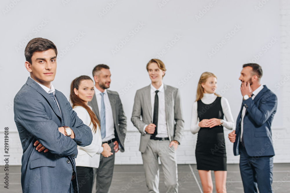 young professional businesspeople standing in hub young professional businesspeople standing in hub