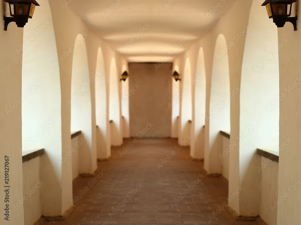 Blurred soft beige vintage castle corridor background