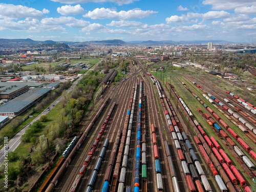 Aerial view of colorful trains on a station