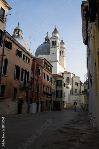 Santa Maria della Salute in Venice . Small street in Venice