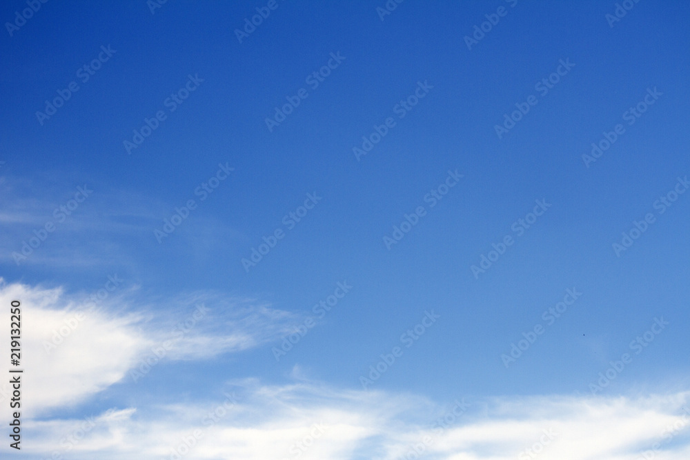 Sky clouds background. Cumulus white clouds in the dark blue sky in the morning Sky clouds background. Cumulus white clouds in the dark blue sky in the morning