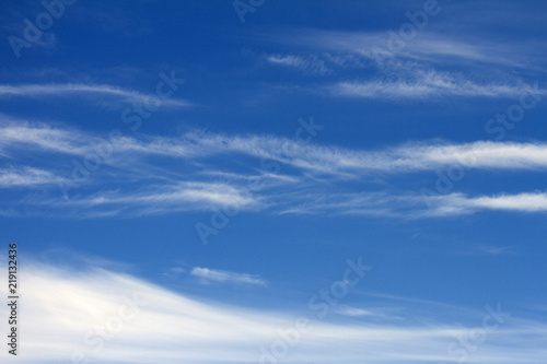 Sky clouds background. Spindrift white clouds in the blue sky in the morning