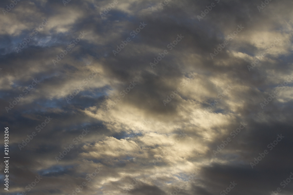 Dark gray clouds blue sky background. Cumulonimbus