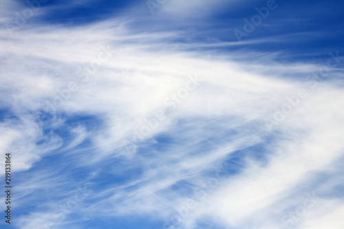 Sky clouds background. Spindrift white clouds in the blue sky in the morning