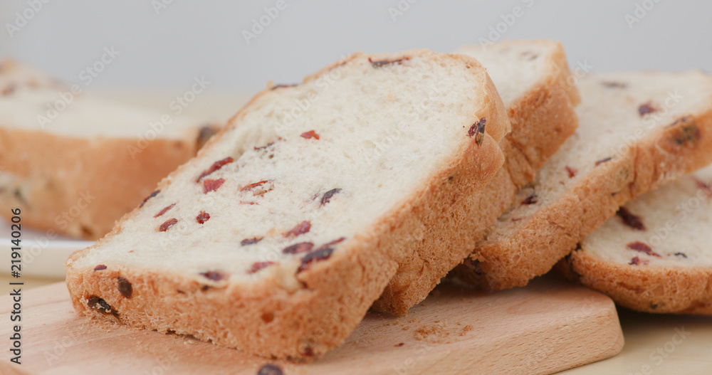 Woman cutting bread Woman cutting bread