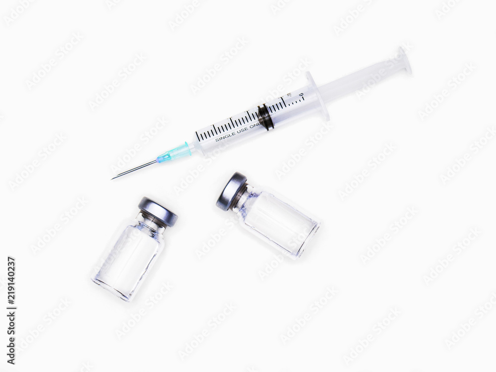 Medicine bottle for injection. Medical glass vials and syringe for vaccination. liquid drug or vaccine for treatment, flu in laboratory, hospital or pharmacy concept isolated on white background. Medicine bottle for injection. Medical glass vials and syringe for vaccination. liquid drug or vaccine for treatment, flu in laboratory, hospital or pharmacy concept isolated on white background.