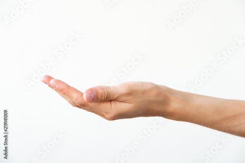 Female hand on a white background. Gesture of offer or request.