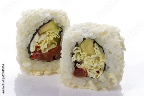 Sushi rolls japanese food isolated on white background.Menu of the Japanese restaurant. Two sushi with vegetables with fish and pineapple close-up