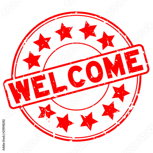 Grunge red welcome word with star icon round rubber seal stamp on white background