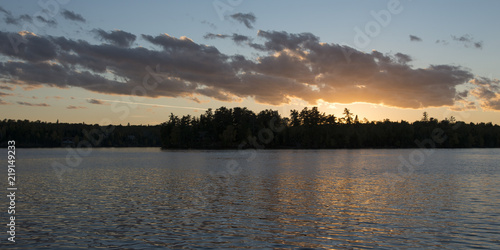 Fototapeta Naklejka Na Ścianę i Meble -  Glow of the sunset at dusk, Lake of The Woods, Ontario, Canada