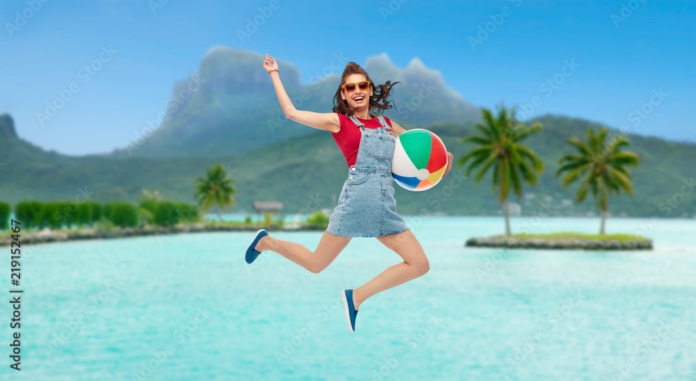 travel, tourism and summer holidays concept - smiling teenage girl in sunglasses with beach ball jumping over white background travel, tourism and summer holidays concept - smiling teenage girl in sunglasses with beach ball jumping over white background