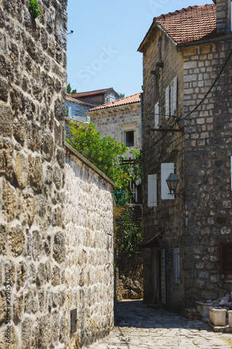 Old stone buildings on narrow streets of medieval towns.