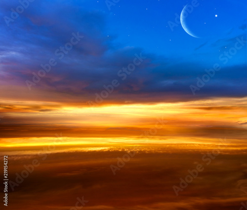  Crescent moon with beautiful sunset background . Generous Ramadan  .  Light from sky . Religion background .