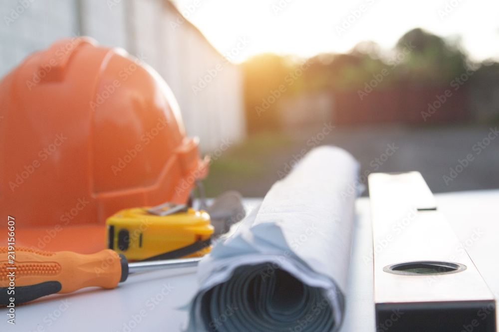 Architect desk ,Business,engineering concept,construction site, soft focus, vintage tone, working with blueprints in the office Architect desk ,Business,engineering concept,construction site, soft focus, vintage tone, working with blueprints in the office