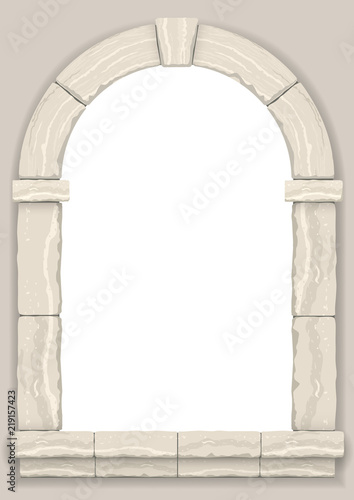 Arch in the wall of beige cut stone