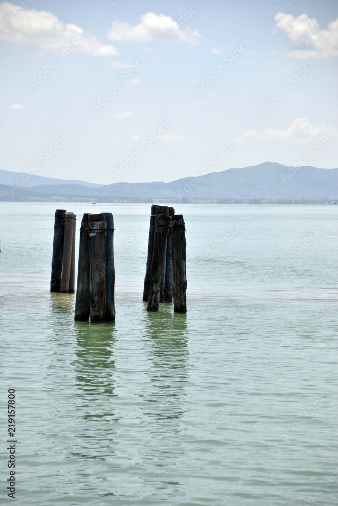 italian lake Trasimeno and village view italian lake Trasimeno and village view