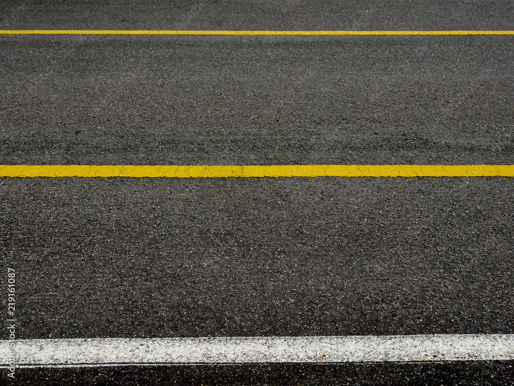Asphalt surface of road with lines abstract background Asphalt surface of road with lines abstract background