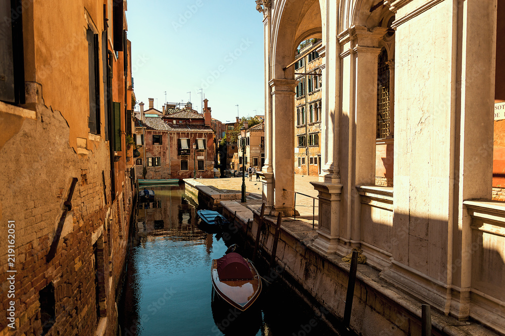 Little canal in the medieval center of Venice