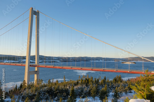 View at Hoga kusten bridge in winter in Sweden. © ianachyrva