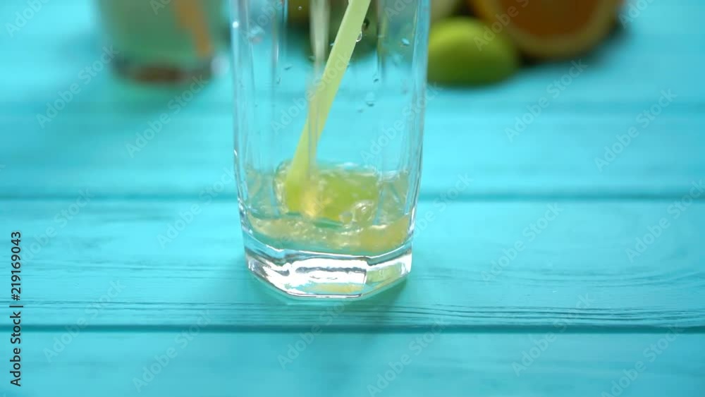 Orange juice being poured into a glass Orange juice being poured into a glass