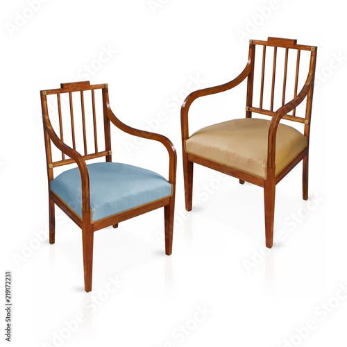 Ancient wooden chairs isolated on white background 